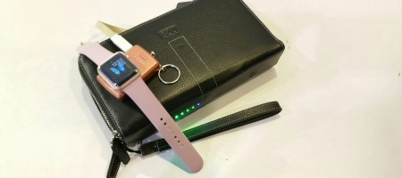 A wallet that charges your devices while you travel hassle free