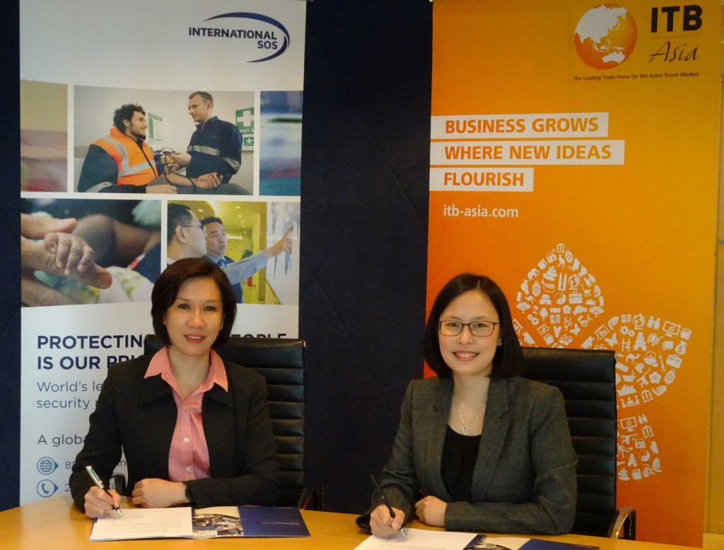 Ms. Juliana Gim, Managing Director of International SOS Singapore and Ms. Katrina Leung, Executive Director of Messe Berlin (Singapore) at the official signing ceremony