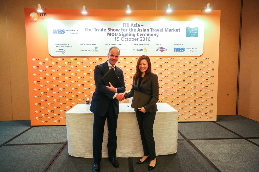 Dr. Christian Goke, CEO, Messe Berlin GmbH and Ms. Melissa Ow, Deputy Chief Executive of the Singapore Tourism Board at the MOU Signing Ceremony