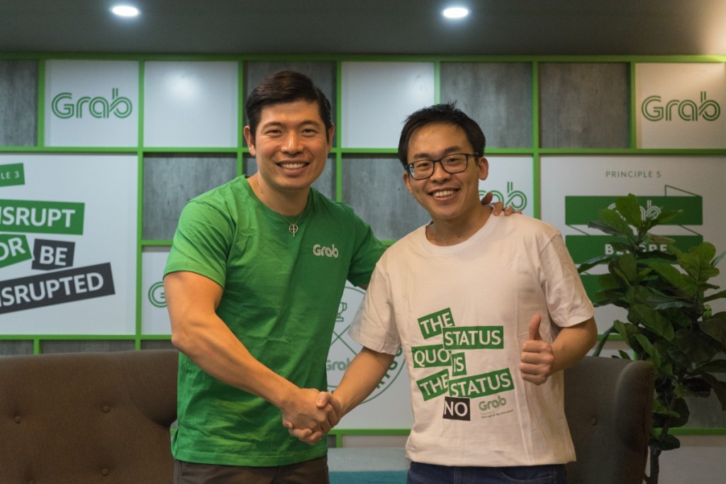 Grab CEO and co-founder Anthony Tan (left), together with Albert Lucius, CEO of Kudo (right)